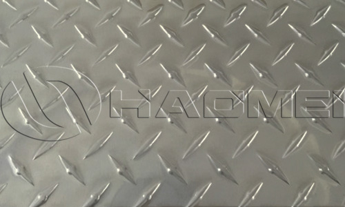 an aluminum checker plate of 1 rib